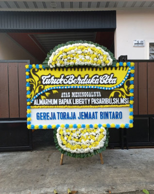 Papan Bunga Duka di Terumbu